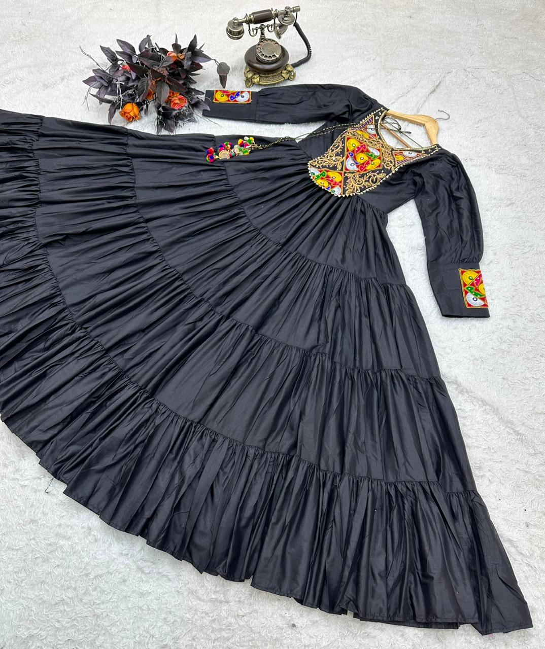 Dal Silk With Embroidery Sequnce And Mirror Work Gown